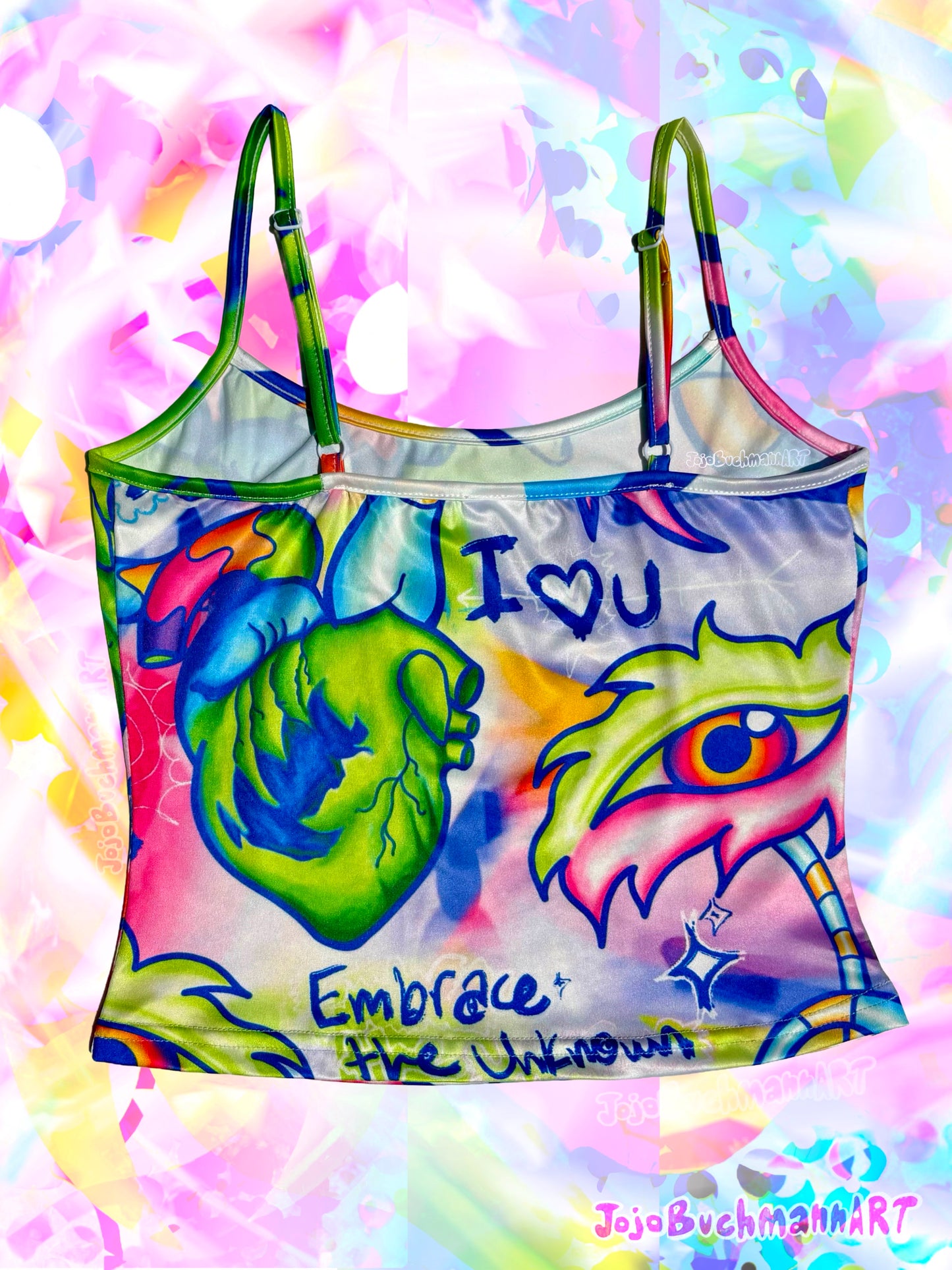 A colorful graphic tank top featuring a stylized anatomical heart, a large eye, and the text 'I [heart] U' and 'Embrace the Unknown' on a white base, set against a vibrant, abstract pastel background.